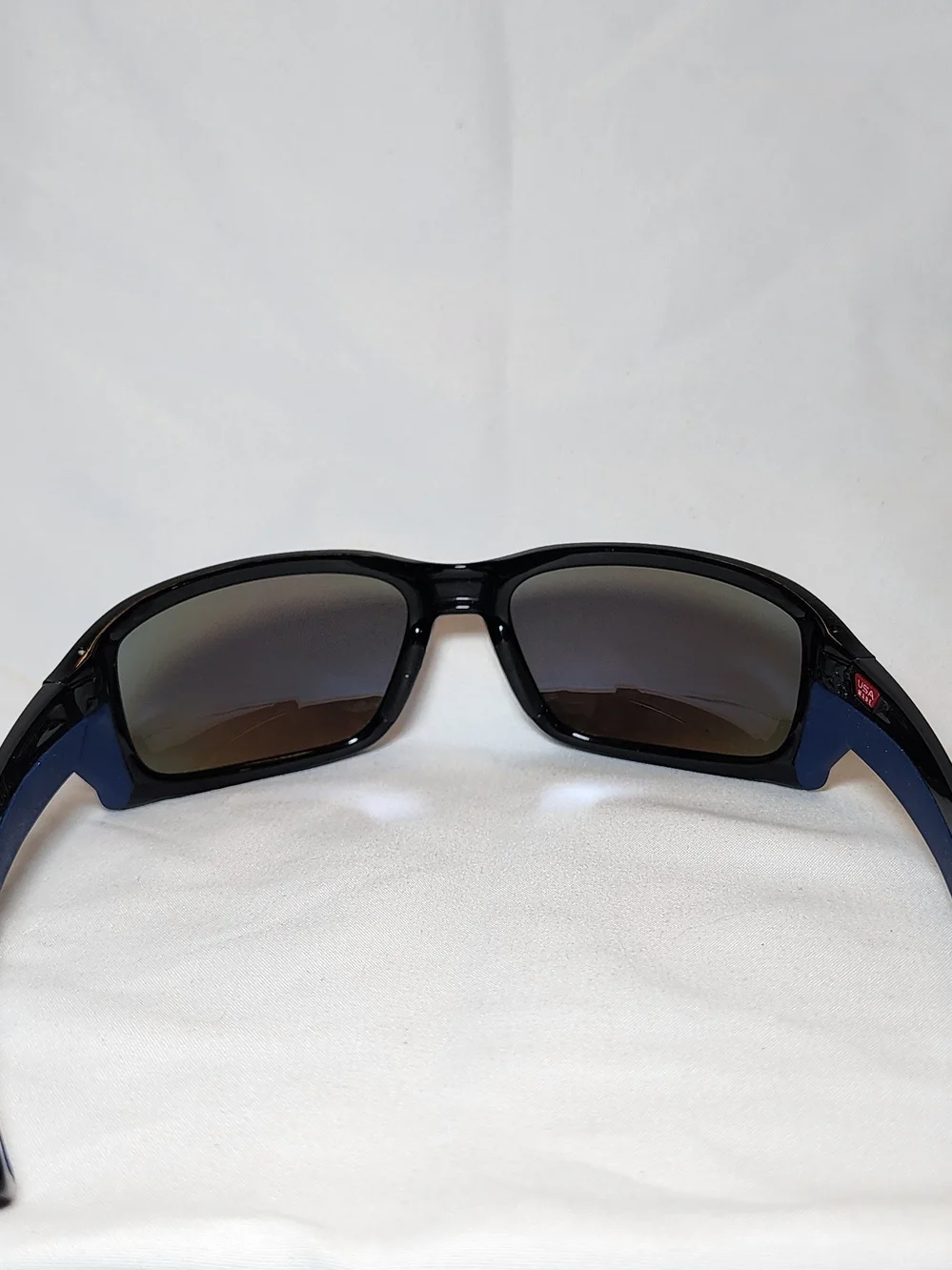 Oakley Black Sunglasses with Blue-Purple Mirrored Lenses